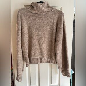 Tan turtleneck sweater